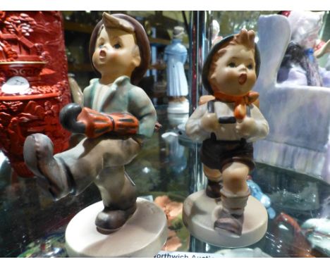 Two Goebel boy figurines