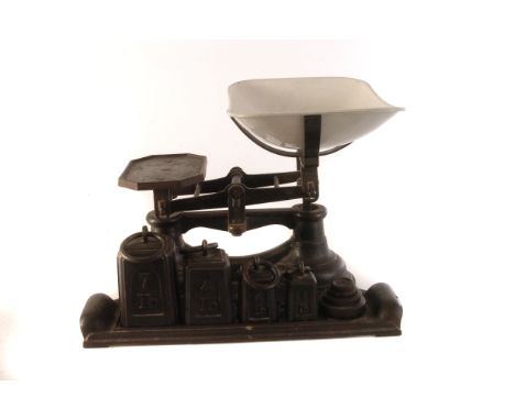 A set of vintage weighting scales, together with a set of graduated weights, 1lb and lighter (parcel)