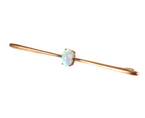 A 9ct gold and opal bar brooch, the oval stone in 9ct gold claw mount, approx 2.7g