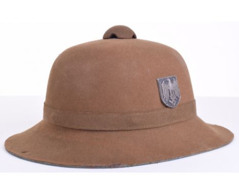 Afrika Korps Pith / Sun Helmet, being the late pattern olive felt with metal eagle and tri-colour cockades. Complete with the