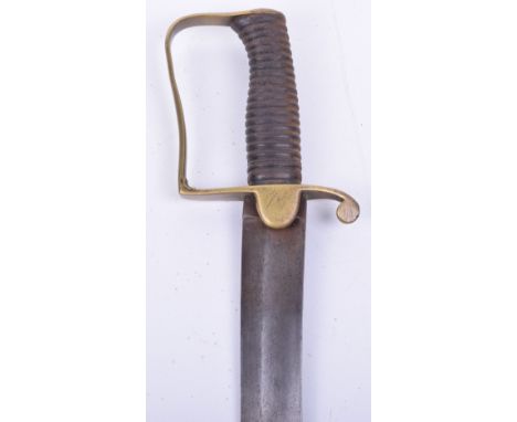 Georgian Brass Hilted Cutlass, D shaped guard with langets, iron ribbed hilt. Curved single edged blade with central fuller. 