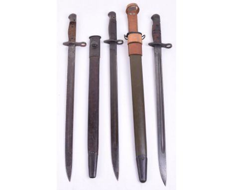 American P17 Bayonet, complete with two piece wooden handles. Green leather scabbard with metal fittings. Complete with B H &