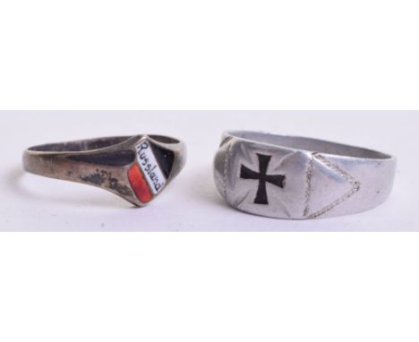 Pair of German Army Soldiers Rings, consisting of a zinc example with black Iron Cross to the centre and a white metal exampl
