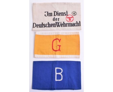 In Service of the German Army Armband, white cotton armband with printed details and ink stamps. Worn by civilians serving wi