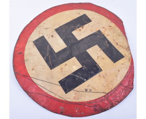 Large Swastika Tin Plaque, unusual large circular tin plaque in the style of a party swastika with red surround. Section cut 