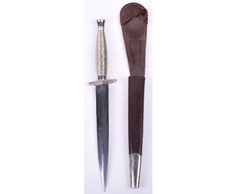 Fairbairn Sykes (F.S) Commando Fighting Knife by Wilkinson Sword, nickel silver ribbed hilt with plain cross guard. Double ed