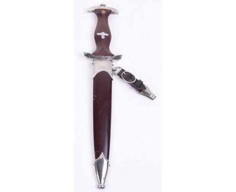 Third Reich SA Dress Dagger, dark brown wood handle with aluminium eagle and enamel SA device inserted. Plated top mount and 