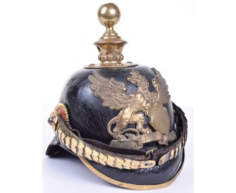 Model 1873 Imperial German Baden Artillery Pickelhaube, leather skull and peaks with brass trim to the front, leather backed 