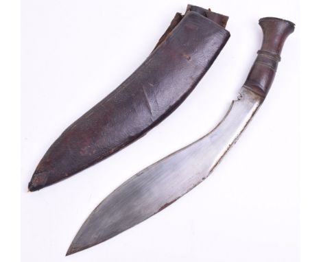 Military Pattern Gurkha Kukri, wooden handle with leather covered wooden scabbard. Blade marked towards the top. Single edged