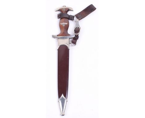 Third Reich SA Mans Dagger with Three Piece Hanger, brown handle with metal eagle and enamel SA device. Housed in the origina