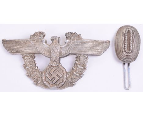 Third Reich Police Shako Insignia, consisting of other ranks pattern helmet plate being eagle and swastika within wreath. Com