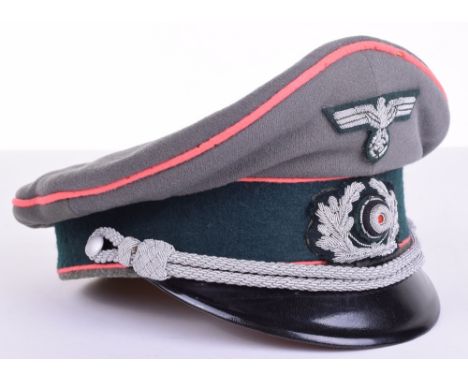 German Army Panzer Officers Peaked Cap, fine quality example with bullion wire officers cap eagle and wreath. Officers chin c