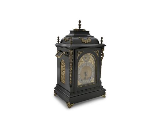 AN IRISH EBONISED AND ORMOLU MOUNTED BRACKET CLOCK, signed Johnston of Dublin, the domed top with raised flambeau finial and 