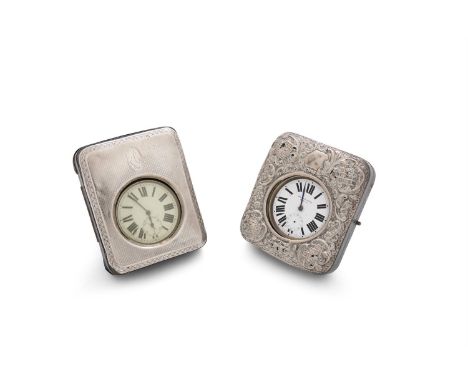 TWO VICTORIAN SILVER MOUNTED LEATHER CASED TRAVEL CLOCKS, Birmingham marks, one with repousse decoration, the other with engi
