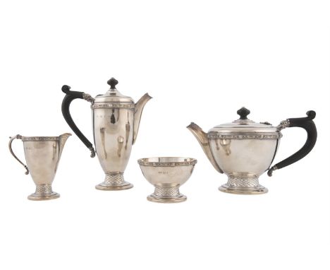 A CELTIC REVIVAL IRISH SILVER TEA AND COFFEE SERVICE, Dublin 1977, mark of Irish Silver Ltd, comprising tea pot, coffee pot, 