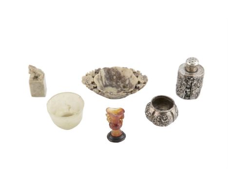 A CHINESE CARVED SOAPSTONE LIBATION CUP, 19th century, 10cm wide, a pair of silver condiments, Hong Kong c.1920, a carved aga