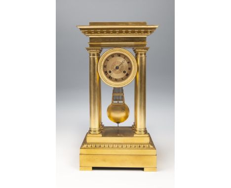 A FINE FRENCH 19TH CENTURY ORMOLU MANTLE CLOCK, of architectural form, with dentil and egg and dart banded pediment above a c