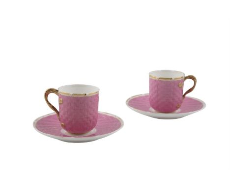 A PAIR OF ENGLISH PORCELAIN COFFEE CUPS AND SAUCERS, with a pink basket weave pattern, gilded design and registration marks