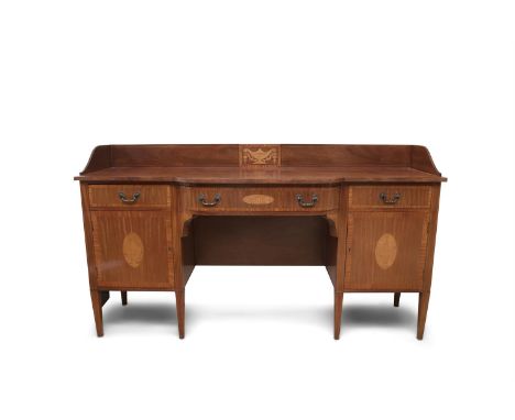 A GEORGE III STYLE MAHOGANY BOW FRONT SIDEBOARD, with galleried back, the top crossbanded above three drawers and twin cupboa