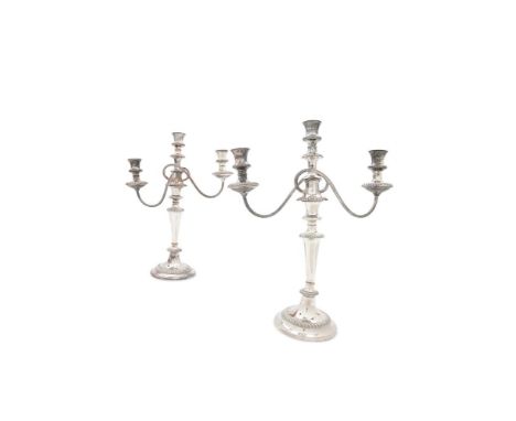 A PAIR OF 19TH OLD SHEFFIELD PLATE SILVER THREE LIGHT CANDELABRA, each with detachable top, vase shaped sockets, above gadroo