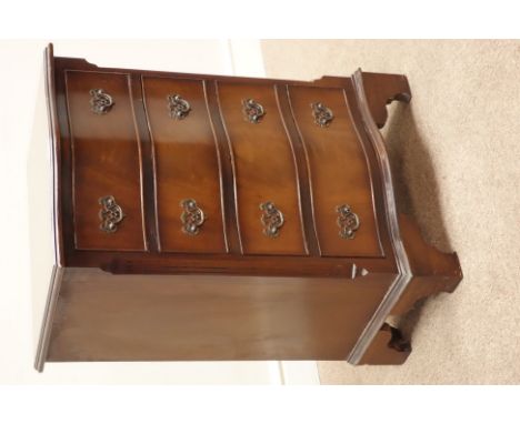 Reproduction mahogany serpentine four drawer chest, fluted canted corners, bracket feet, W52cm, H75cm, D39cm   Condition Repo