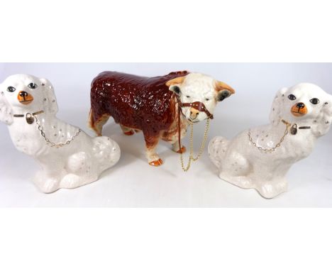 Large ceramic Staffordshire Nelson Bull model and a pair of Staffordshire type dogs (3)   Condition Report   Click here for f