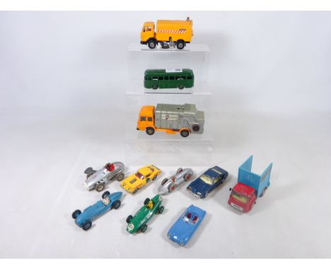 Three Dinky diecast racing cars, Schuco racing car, Corgi Lotus, Chipperfield Circus, Road Sweeper and other Corgi and Dinky 