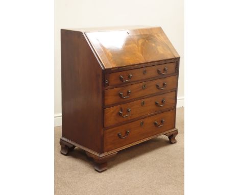 Early Georgian mahogany and figured mahogany bureau, fall front above four graduating drawers, well fitted interior inset wit