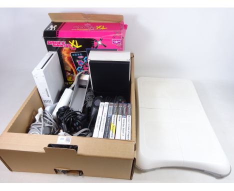 Nintendo Wii, Wii board,  Playstation 2 with controllers, PS2  and Wii games and accessories in one box  (This item is PAT te