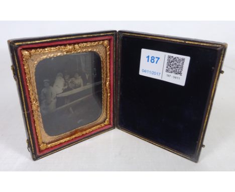 Victorian Ambrotype family photograph in gilt and leather case    Condition Report   Click here for further images, condition