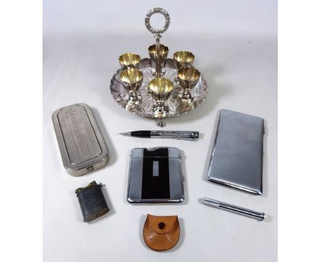 Elkington silver plated egg cup holder, Ronson pen lighter, cigarette case, novelty lighters etc    Condition Report   Click 
