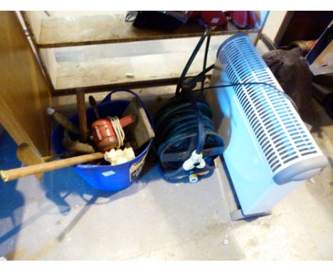 Collection of mixed workshop tools including a hose reel and a heater