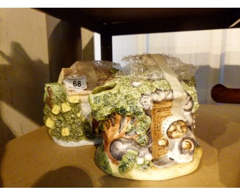 Two decorative ceramic Beatrix Potter themed teapots