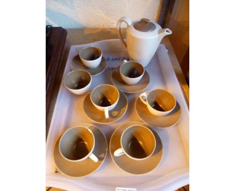 Poole coffee set lacking creamer with one cup chipped