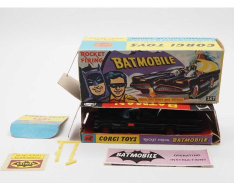 A CORGI Toys 267 Batmobile - first version with gloss black body , pulsating exhaust flame and no tow hook - G/VG with G inne