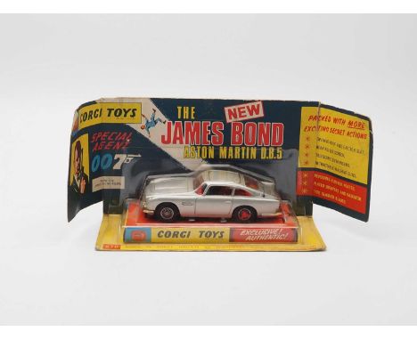 A CORGI 270 'James Bond' Aston Martin DB5, silver with gold grill and bumpers - VG in G/VG pictorial bubble box with VG inner