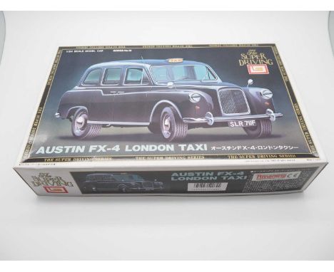 A Japanese IMAI No 13 1:24 scale Austin FX4 Taxi plastic kit  - E, kit  still sealed in a G/VG box