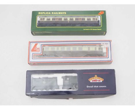 A BACHMANN OO gauge class A4 steam locomotive 'Seagull' in BR green together with a LIMA GWR railcar and REPLICA GWR coach - 