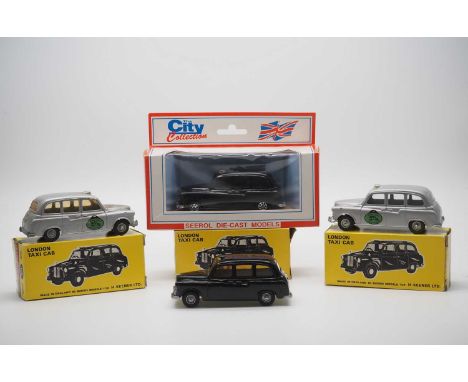 A group of 1:43 scale diecast Austin FX4 London Taxi models by BUDGIE and SEEROL, comprising: z2 limited edition silver Londo