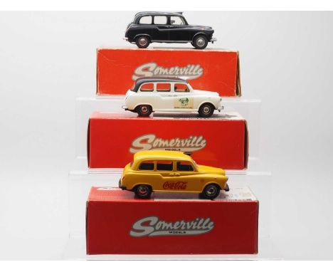 A group of hand built 1:43 scale white metal Austin FX4 Taxis models by SOMERVILLE comprising a plain black example, a white 