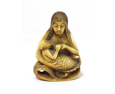 A Japanese ivory netsuke,19th century, of a mermaid and her baby, with a two-character Kanji signature to base, 4.5cm highCon