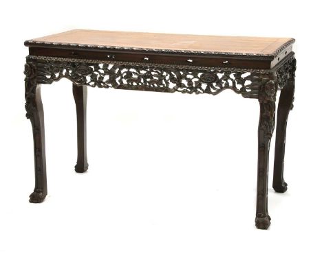 A Chinese rosewood centre table,19th century, with a pierced and carved apron, on carved cabriole legs,108cm wide57cm deep74c