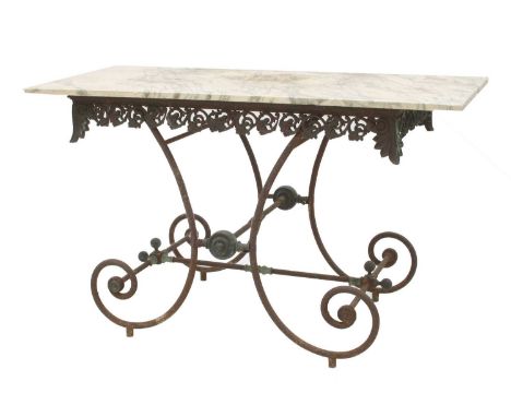 A wrought iron and brass garden or arbour table,19th century, with a marble top,138cm wide61cm deep85cm high