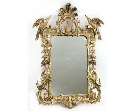 A Chippendale-style giltwood wall mirror,20th century, with pierced surmounted by ho-ho birds,85cm wide130cm highProvenance: 