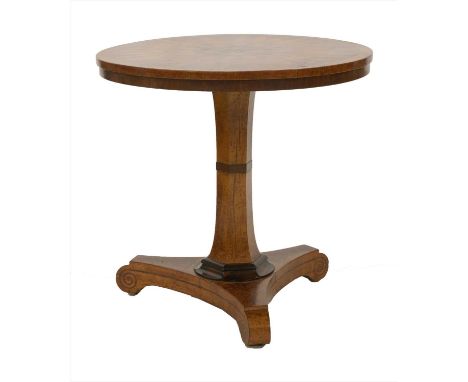 A George IV burr elm and specimen wood centre table,the circular top with parquetry sunburst and line inlaid decoration, abov