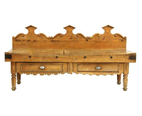 A Victorian butcher's block sideboard,from a butcher's shop, with a low back and two drawers below, on reeded turned legs,251