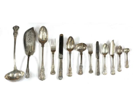 A large composite King's pattern silver cutlery set,principally London 1820, comprising: 44 dinner forks, of which 32 by Geor