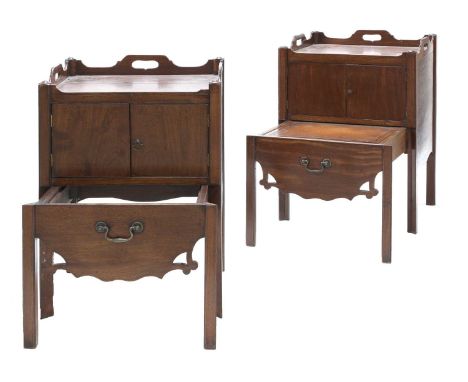A pair of George III Chippendale-style mahogany bedside tray top commodes,c.1760, each having a galleried top with pierced cu