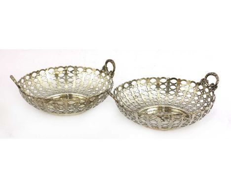 A pair of pierced silver baskets,by Mappin &amp; Webb, Birmingham, 1909,each with a ribbon-tied laurel wreath handle to eithe