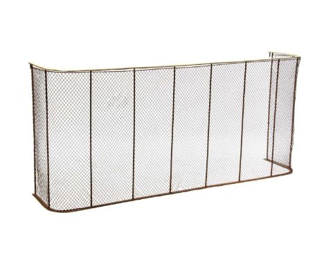 A large Victorian nursery fireguard,of 'D' shape form, having a brass top rail over a mesh front,167cm wide37cm deep75cm high